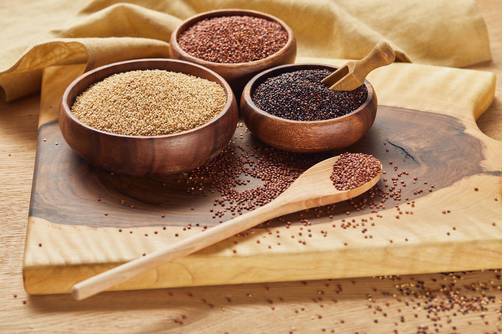 stock-photo-white-black-red-quinoa-wooden-bowls-spoon-wooden-chopping-board stock-photo-white-black-red-quinoa-wooden-bowls-spoon-wooden-chopping-board