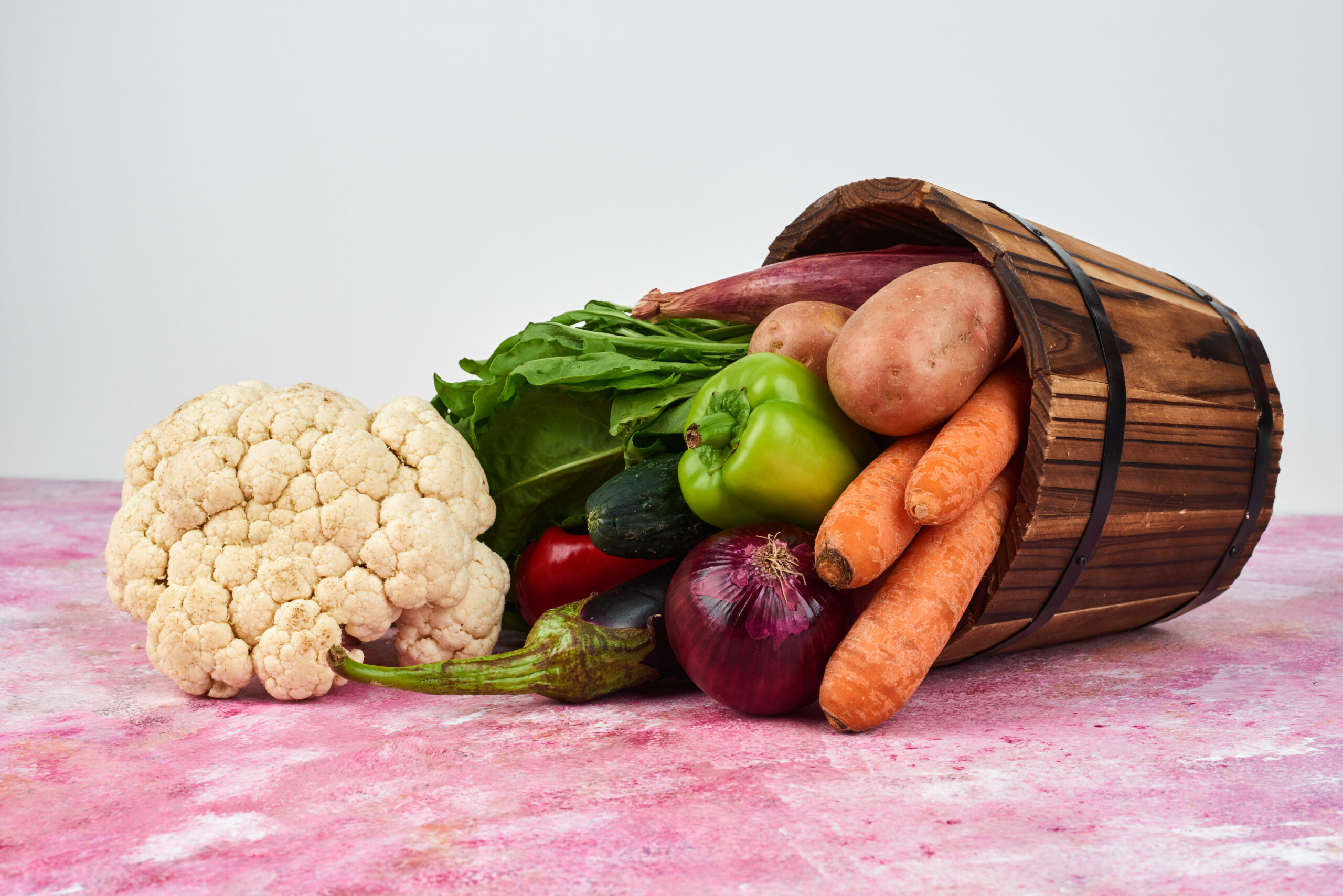 Vegetables in a wooden bucket Vegetables in a wooden bucket. High quality photo